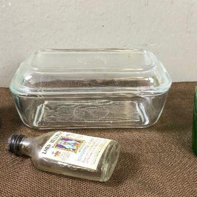Lot #87 Glass Refrige. Container with lid, vase, insulators 