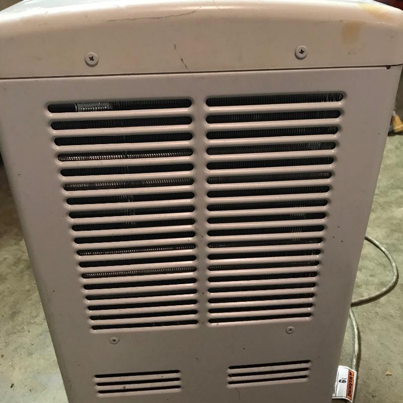 Lot 351 - Whirlpool AccuDry Dehumidifier and Outdoor Extension Cord |  EstateSales.org