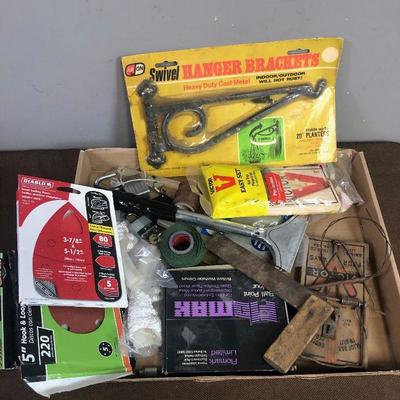 Lot # 117 Garage Items- rat trap, sand paper, locks