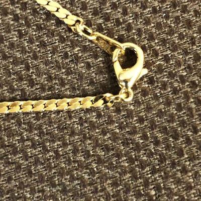 Lot # 160 Garnet on a gold tone chain 'ladies Costume Jewelry