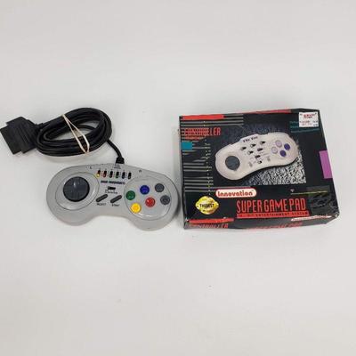 2 SNES Turbo Controllers - One is New in a damaged box