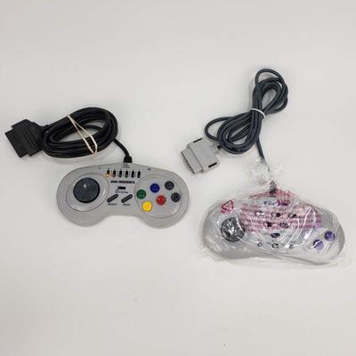 2 SNES Turbo Controllers - One is New in a damaged box