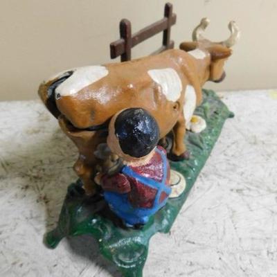 Milking Farmer Cast Iron Coin Bank from Book of Knowledge