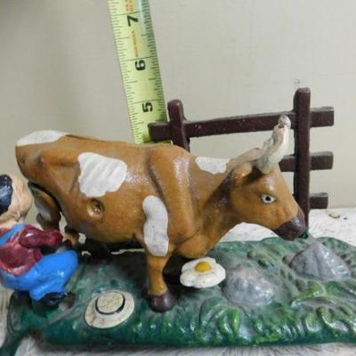 Milking Farmer Cast Iron Coin Bank from Book of Knowledge