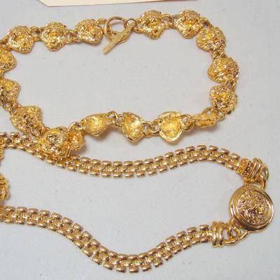 Lot 2031 - Pair of Necklaces Gold Color with Lion Head Design