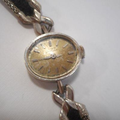 Lot 3092 - 14K White Gold Watch 14K Yellow Gold + 925 Silver