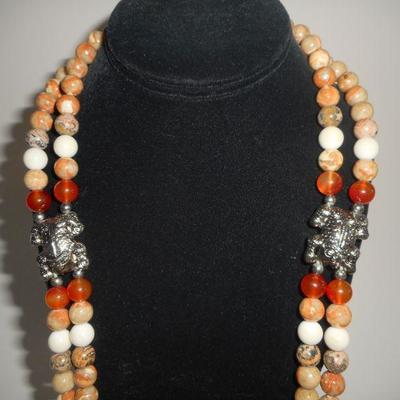 Lot 2052 - Stone Necklace with Frogs