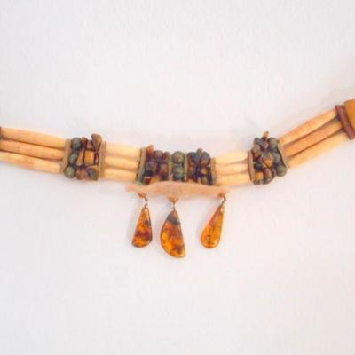 Lot 2055 - Bone and Amber choker with suede
