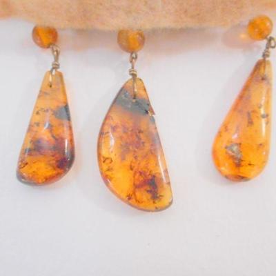 Lot 2055 - Bone and Amber choker with suede