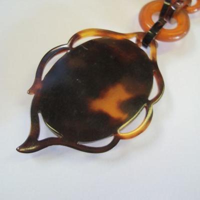 Lot 2072 - Tortoise Shell(?) Style Cameo Necklace