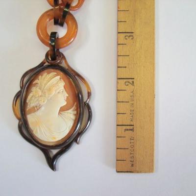 Lot 2072 - Tortoise Shell(?) Style Cameo Necklace