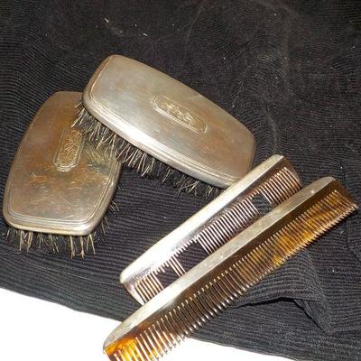 Vintage 4 piece Sterling silver Brushes and comb set.