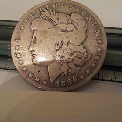 1886 Morgan silver dollar.