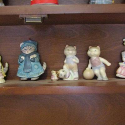 Shelf Full of Miniture Collectible Kitty Cucumber Ceramic Cats