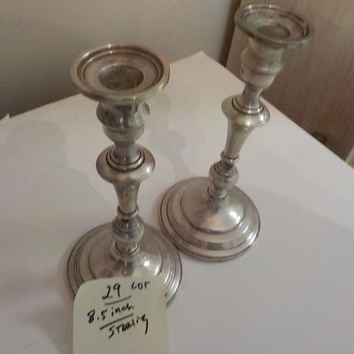2 - 8.5 in. sterling candle holders.