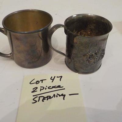 2 Vintage Sterling cups .