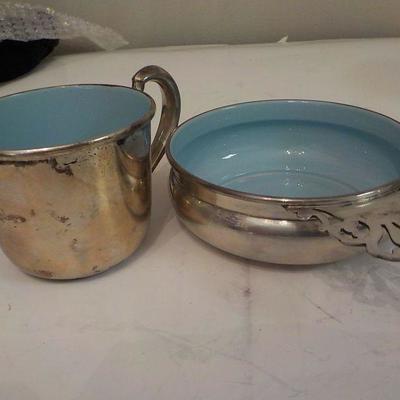 Sterling silver cup mixer and cup.
