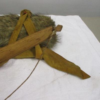 Lot 81 -Wood Carved Bow With Animal Pelt Quiver 40