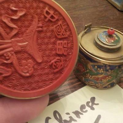 Chinese ming coin and incense .