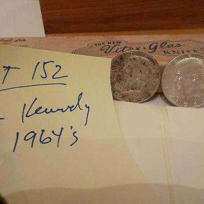2 -1964 Kennedy half dollar coins.