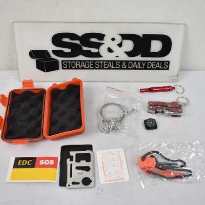 7 in 1 SOS Emergency Kit, Multi-Purpose Survival Equipment Kit. Case is cracked