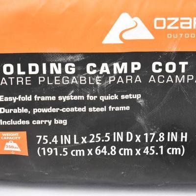 Ozark Trail Compact Folding Cot, Brown. Cot is like new, bag zipper doesn't work