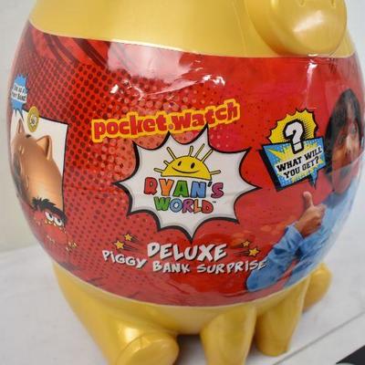 Ryan's World Deluxe Piggy Bank. Open. 28 unopened toys