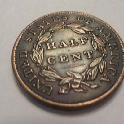 1834 Braided Half cent liberty coin.