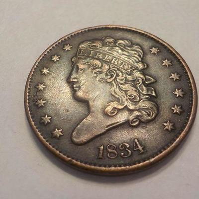 1834 Braided Half cent liberty coin.