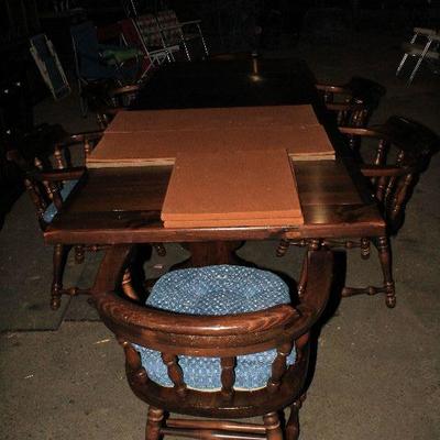 Ethan Allen Solid Pine table and 6 captain's chairs.