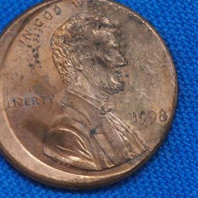 1998 Off Center Lincoln Cent     878