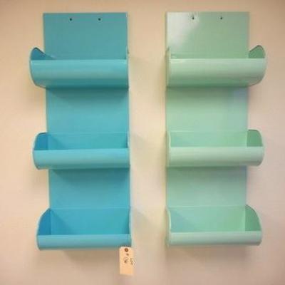 Lot 136 - Two different shades of blue metal wall hanging caddies 