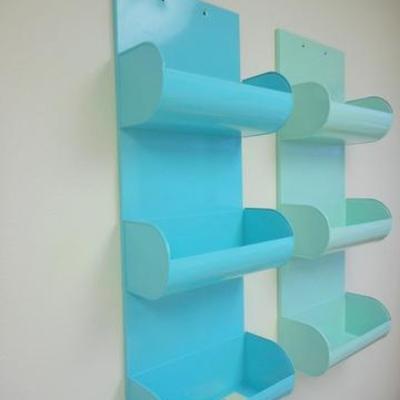 Lot 136 - Two different shades of blue metal wall hanging caddies 
