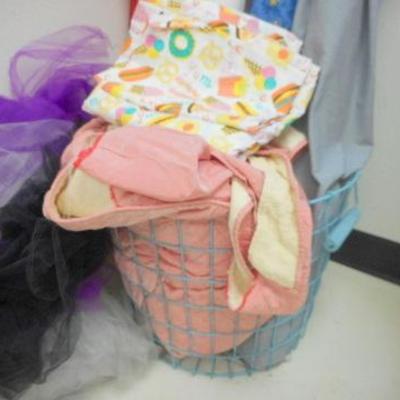 Lot 137 - Bolts of fabric with wire basket - some tulle