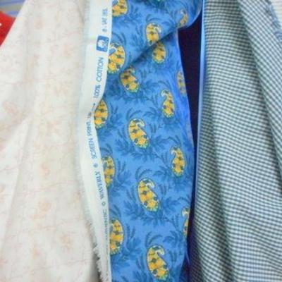Lot 137 - Bolts of fabric with wire basket - some tulle