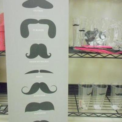 Lot 143 - Mustache Party Favors and Decor 