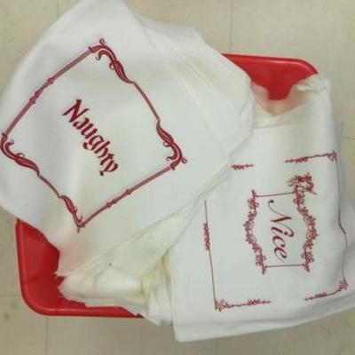Lot 152 - 100+  Ready to sew pillow covers Naughty and Nice
