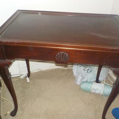 Coffee Table with fan carved design.