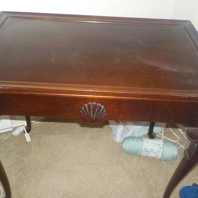 Coffee Table with fan carved design.