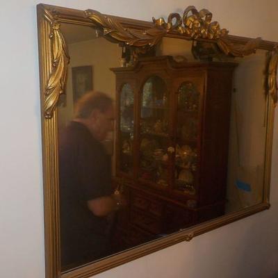 Gilt Metal frame mirror.