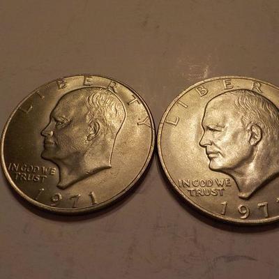 2- 1971 Eisenhower silver dollars.