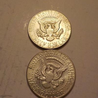 2- 1966 Kennedy half dollar coins.