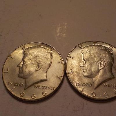 2- 1966 Kennedy half dollar coins.