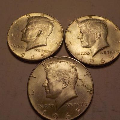3- 1965 Kennedy Half dollar coins.