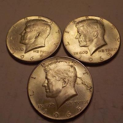 3- 1965 Kennedy Half dollar coins.