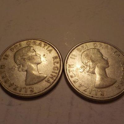 2- 1964 and 1961 canadian silver quarters.