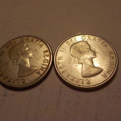 2- 1964 and 1961 canadian silver quarters.