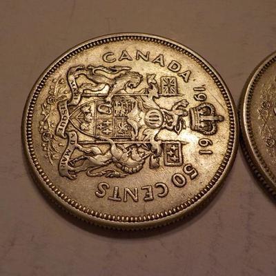 2- 1964 and 1961 canadian silver quarters.