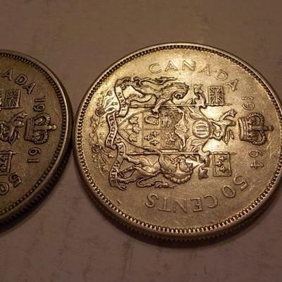 2- 1964 and 1961 canadian silver quarters.