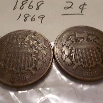 1868 - 2 cent coin and 1869 - 2 cent coin.
